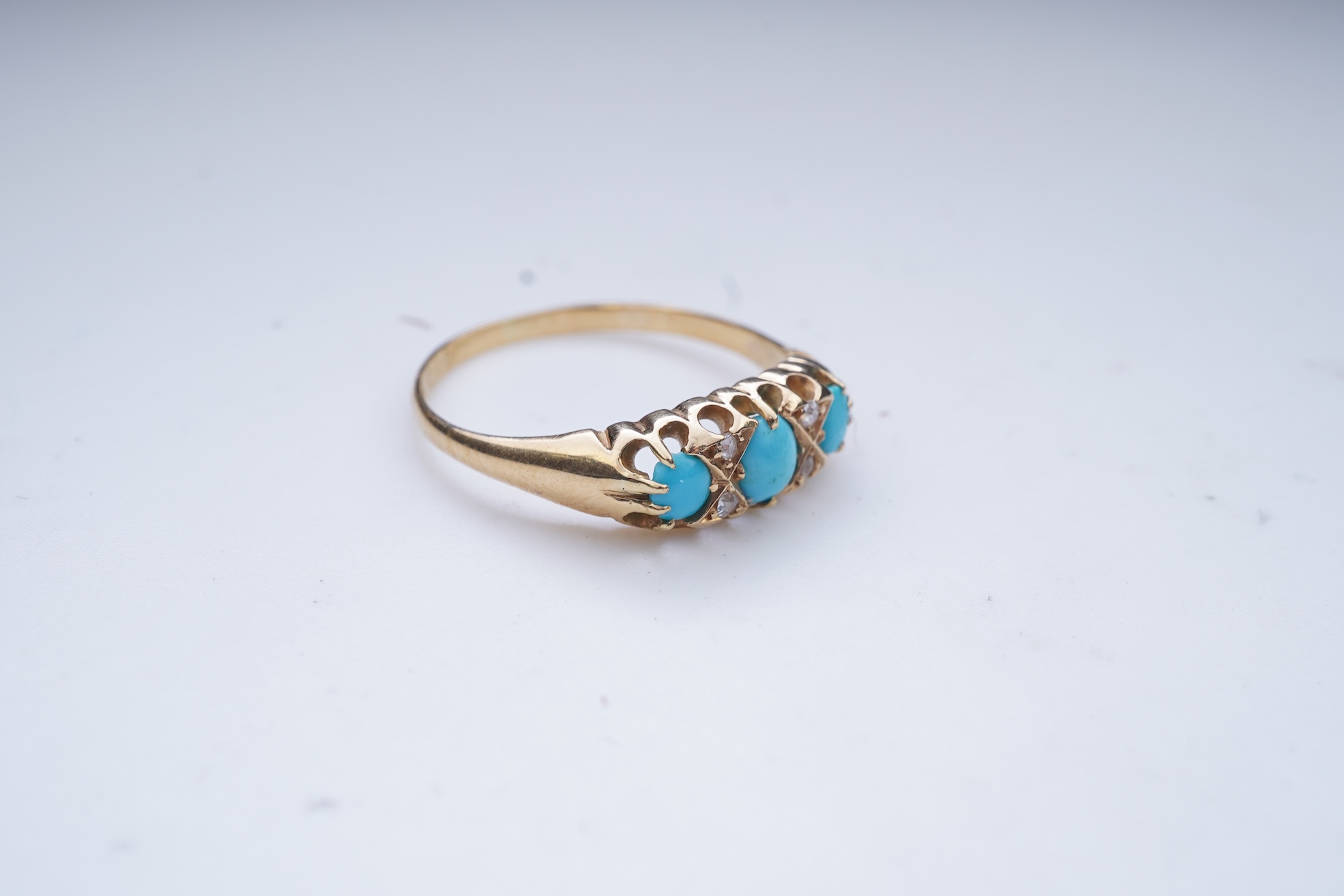 A turquoise and diamond ring, late 19th/early 20th century